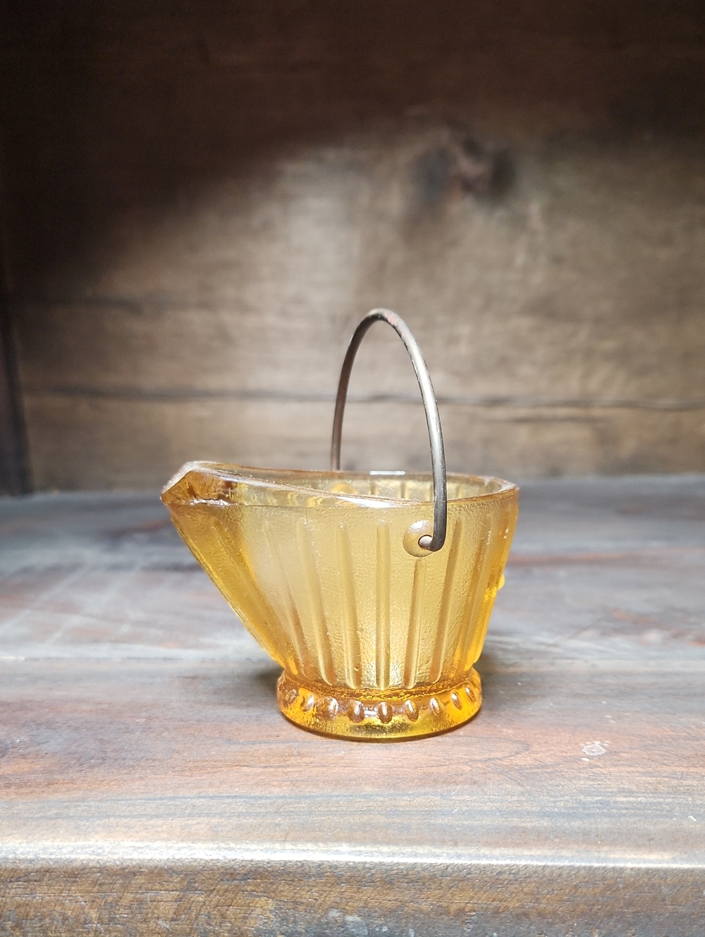 Amber glass miniature coal/scuttle with scoop